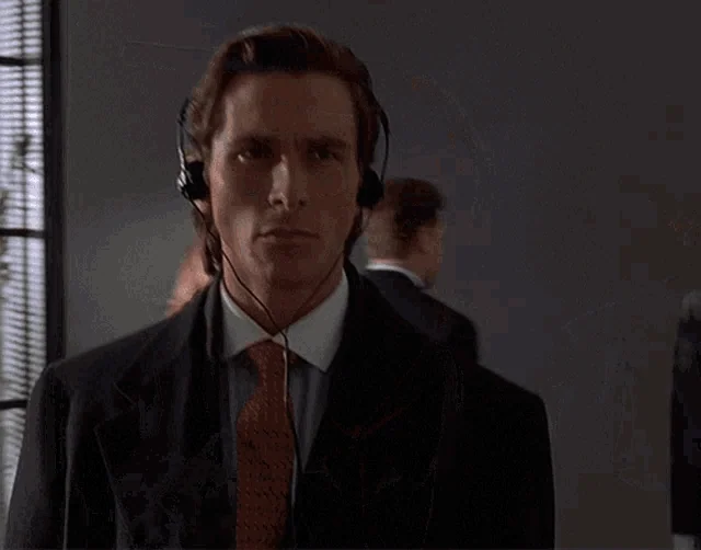 Christian Bale (American Psycho) regard fixe sérieux — concentration, intensité