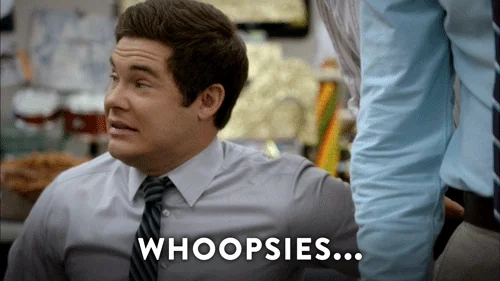 Adam DeVine (Workaholics) with sheepish grin, text 'WHOOPSIES...', office setting, casual mistake vibe