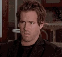 Ryan Reynolds frowning in confusion
