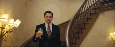 Leonardo DiCaprio with a drink, Wolf of Wall Street party/toast scene