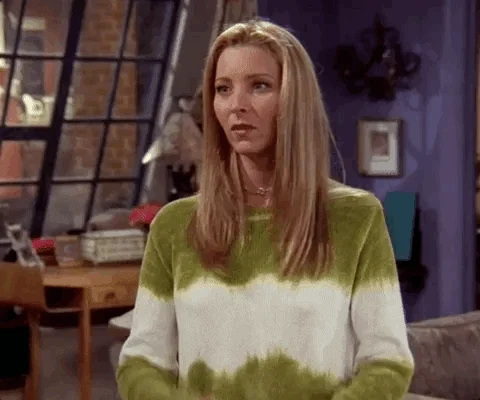 Phoebe (Friends) air perplexe/blasé — indifférence, confusion douce