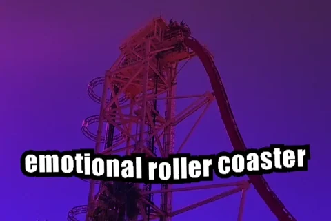 Roller coaster ride at night with text 'emotional roller coaster', purple/orange lighting, people on the ride