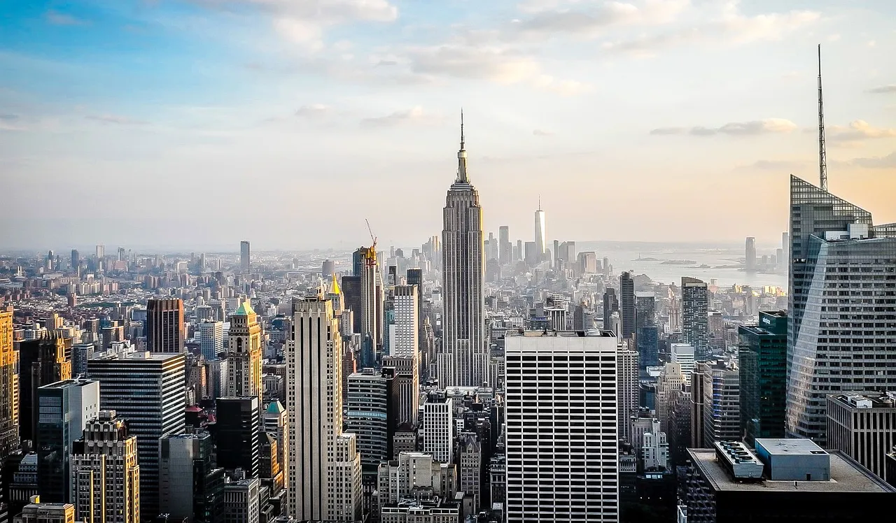 An aerial view of the New York City skyline with the Empire State Building prominent.